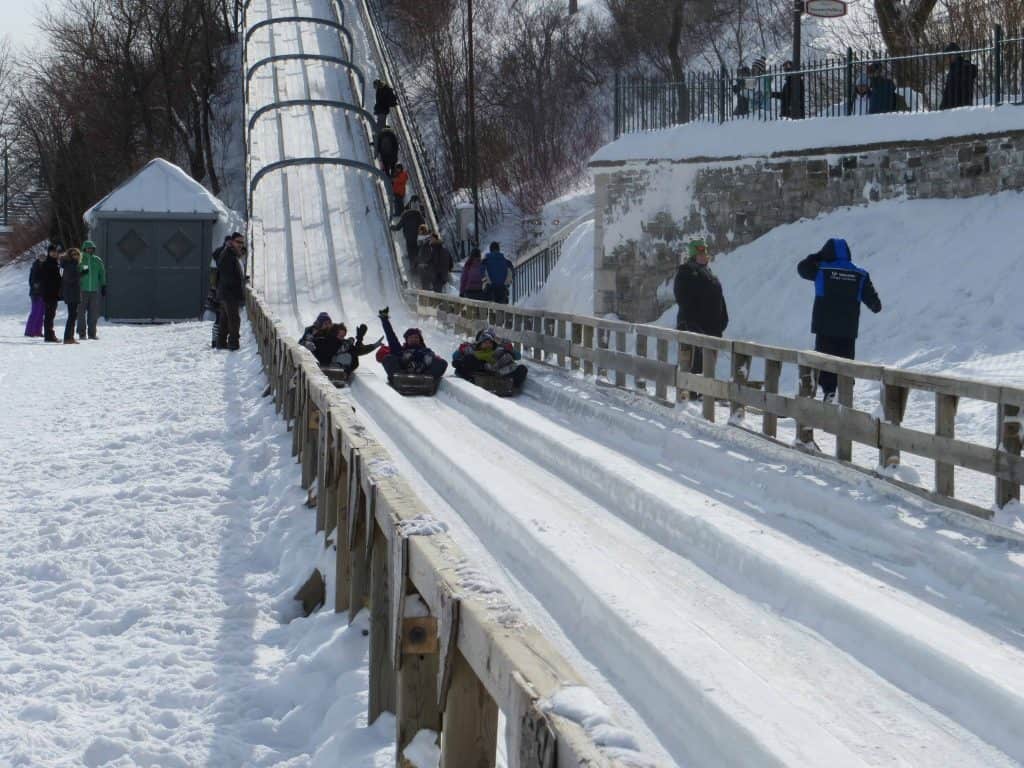 Three toboggan slides at end of slide on dufferin terrace in quebec city.