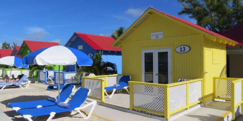 colourful beach bungalows and beach chairs-princess cays-bahamas