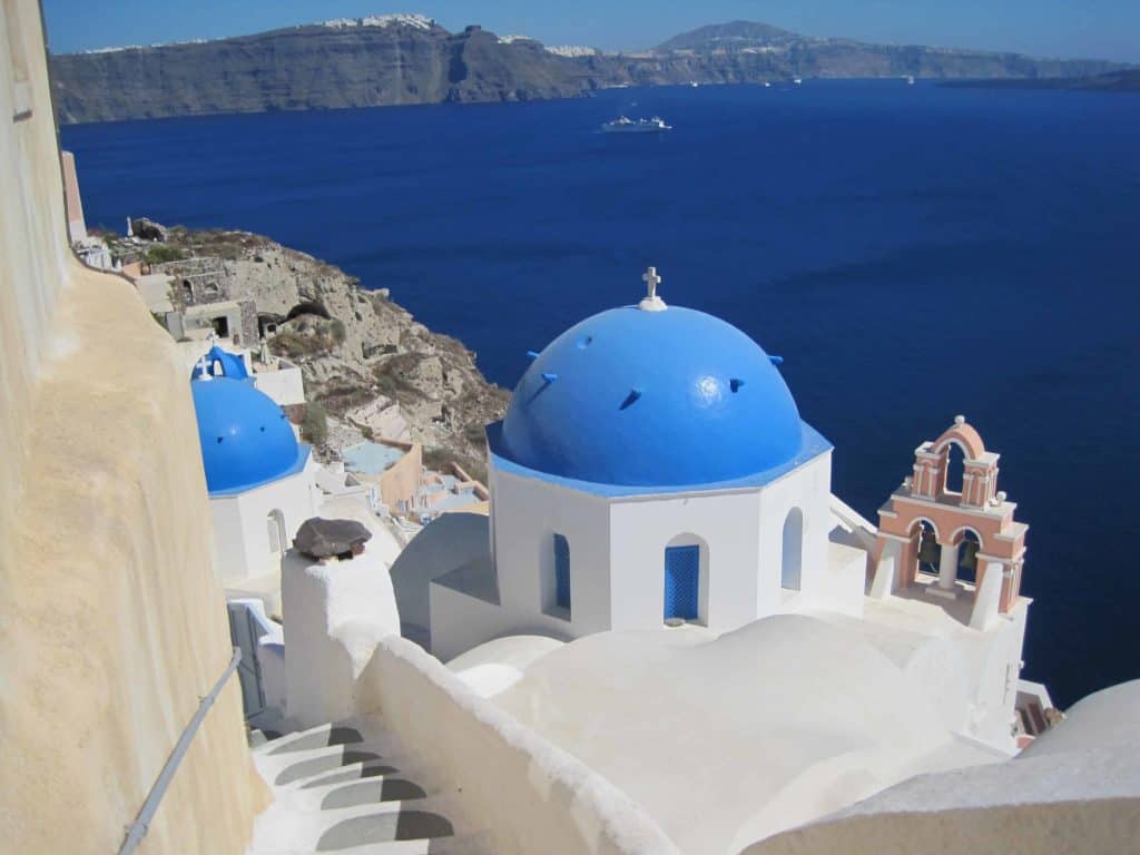 oia-santorini-greece-blue domed churches by sea