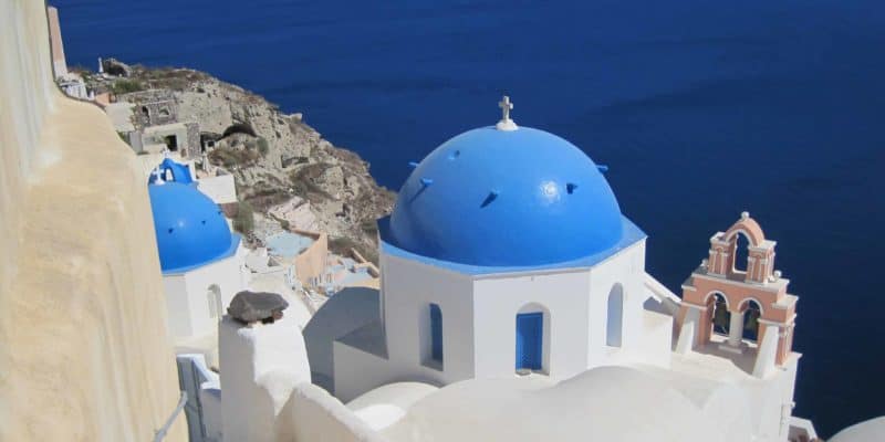 oia-santorini-greece-blue domed churches by sea