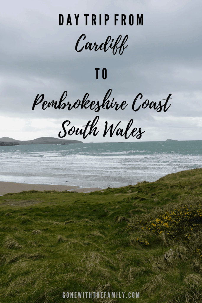 Pinterest image - photo with ocean viewed from Pembrokeshire Coastal Path at Whitesands Beach with text overlay reading Day Trip from Cardiff to Pembrokeshire Coast South Wales.