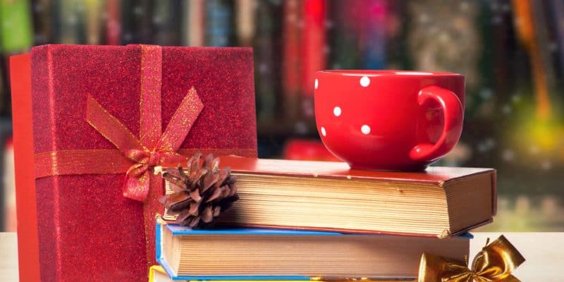 stacked books-red cup and red wrapped box