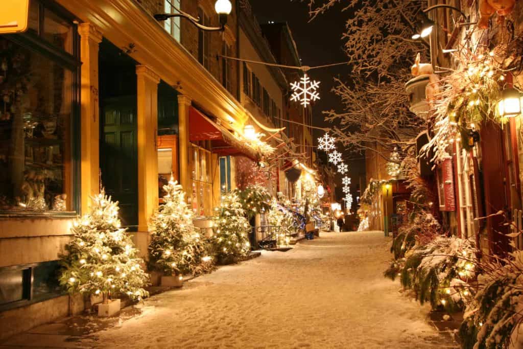 quebec city street decorated for christmas at night