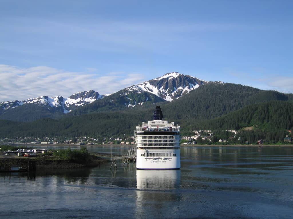 cruise ship anchored-mountains in background-juneau-alaska