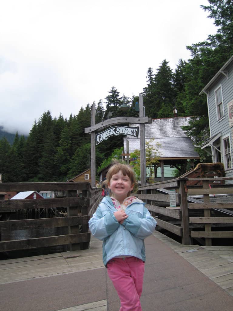 young girl at creek street entrance-ketchikan-alaska