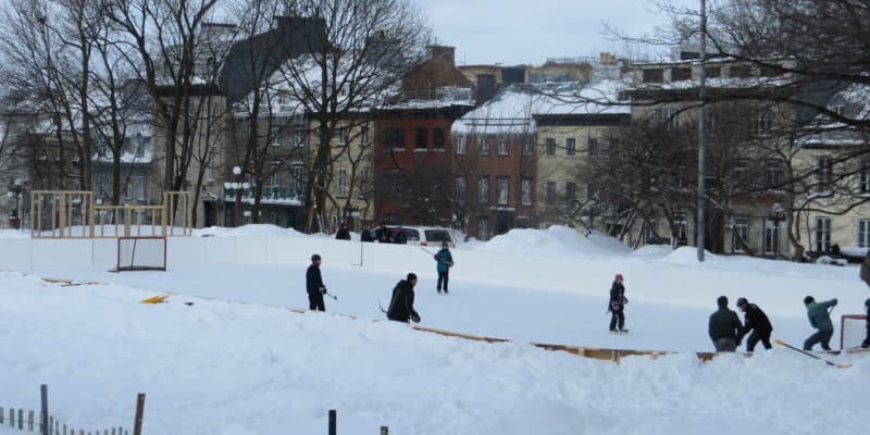 hockey players on outdoor ice rink-winter in quebec city