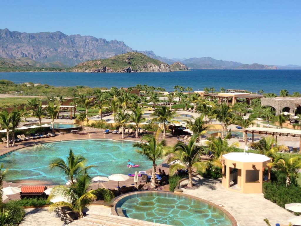 Pools and grounds with palm trees at the Villa del Palmar in Loreto, Mexico.