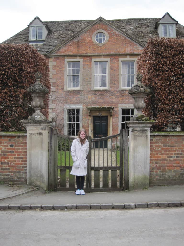 Teen girl outside Harry Potter filming site for Professor Slughorn's home.