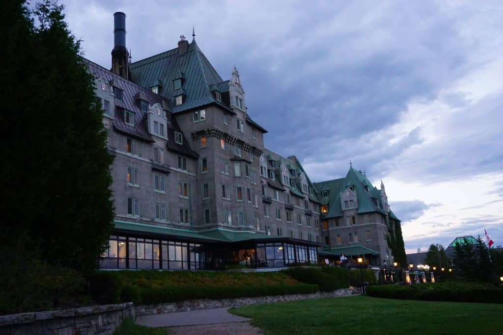 Exterior of Manoir Richelieu at dusk.