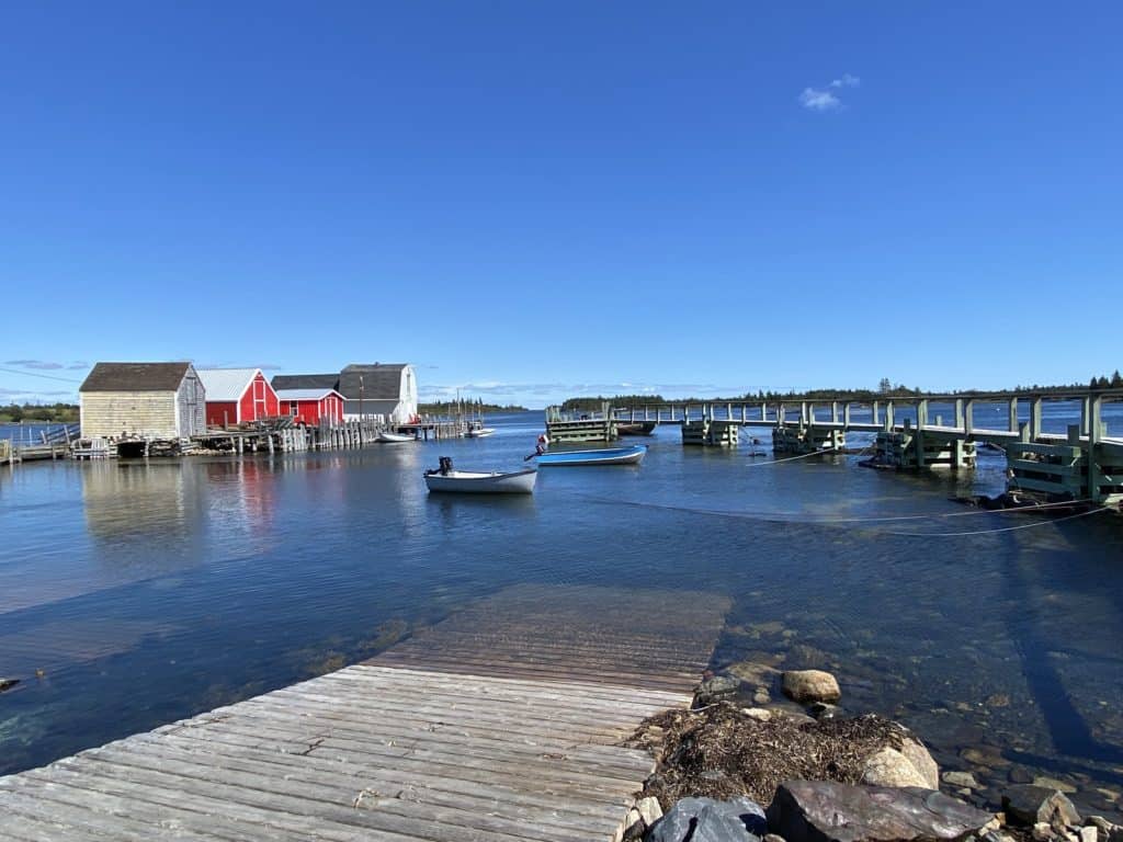 Fishing huts and bloats in water at Blue Rocks, Nova Scotia.