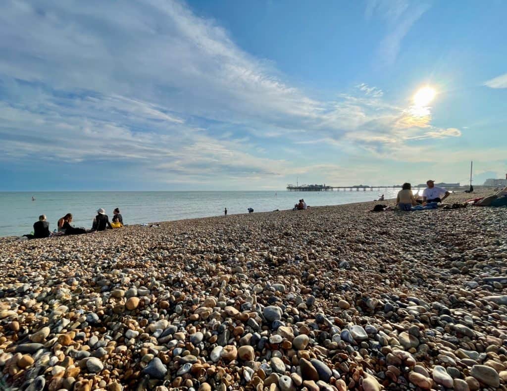 People on a beach in Brighton, United Kingdom.