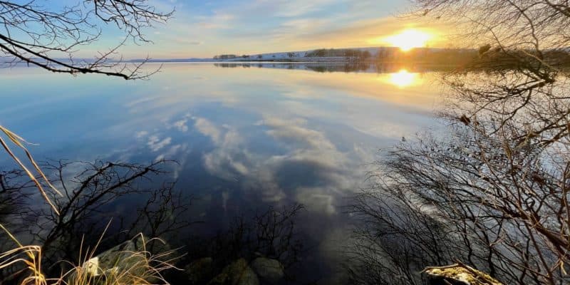 sun shining on water - uk couples getaways feature image.