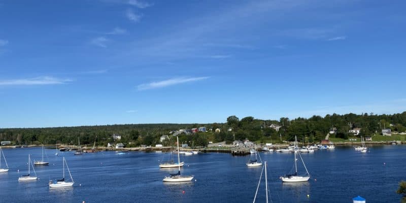 Sailboats in water in front of Tuna Blue in Hubbards, Nova Scotia.