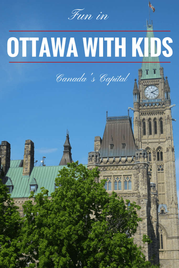 Pinterest Image - photo of Parliament buildings with text overlay reading Ottawa with Kids - Fun in Canada's Capital.