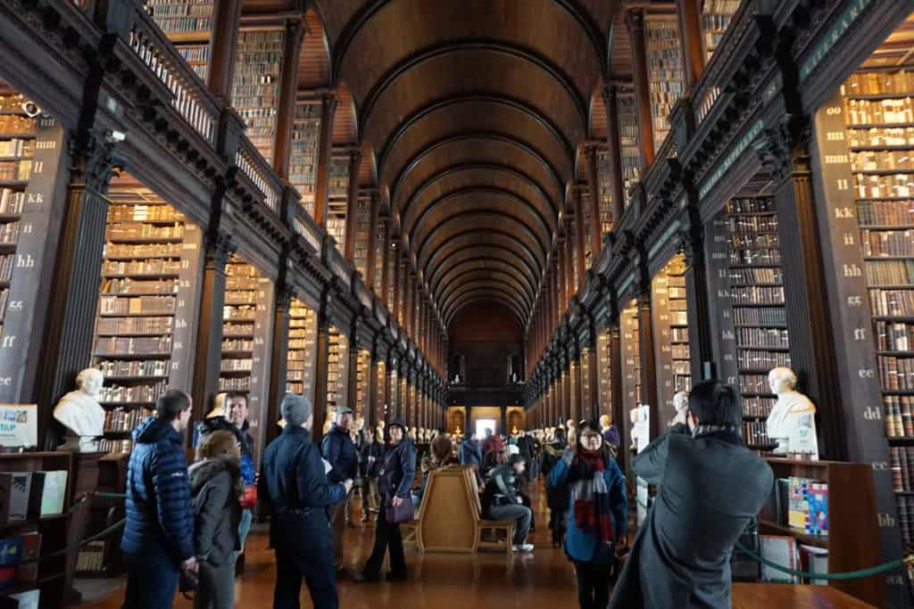 Library of Trinity College, Dublin with crowds of people.