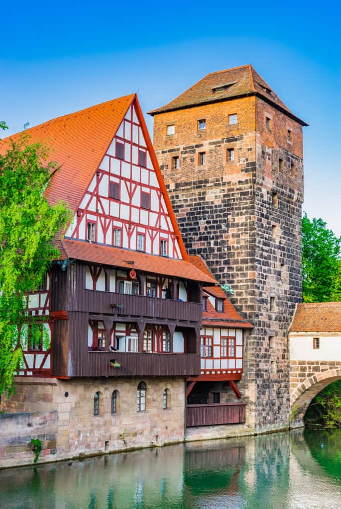 Historical old town of Nuremberg with view of Weinstadel and Henkerturm tower.