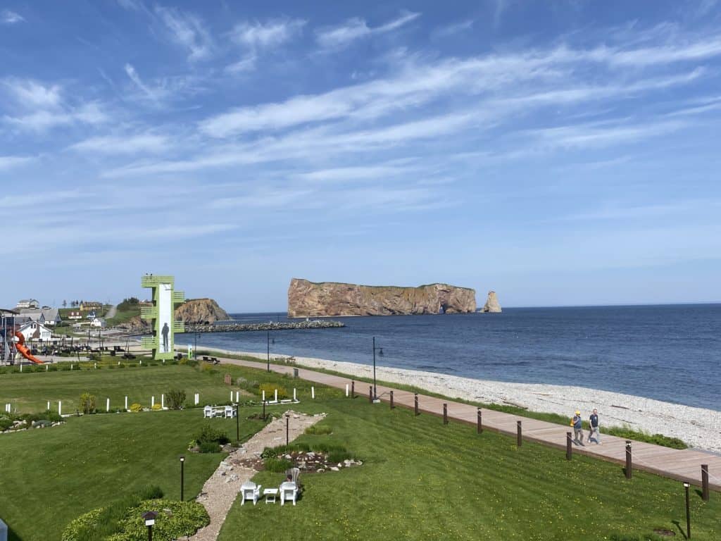 view of Perce Rock in Quebec from the balcony of La Normandie hotel