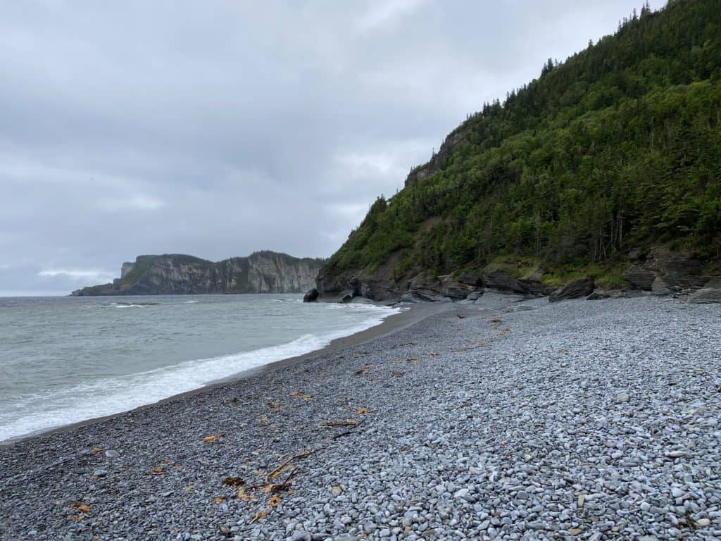 Rocky beach with cliffs at Cap-Bon-Ami in Forillon National Park, Gaspe, Quebec.