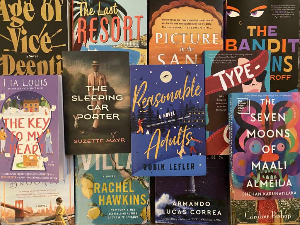 Flat lay of new books to read winter 2023.
