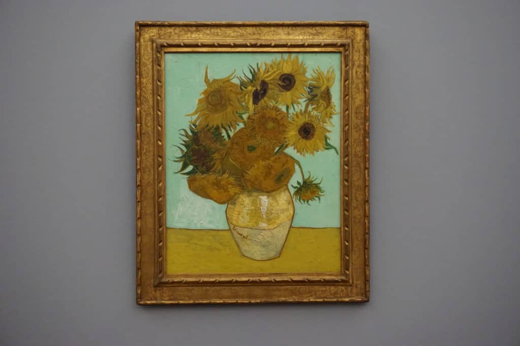 Van Gogh's painting 'Sunflowers' hanging on the wall at the Neue Pinakothek in Munich, Germany.