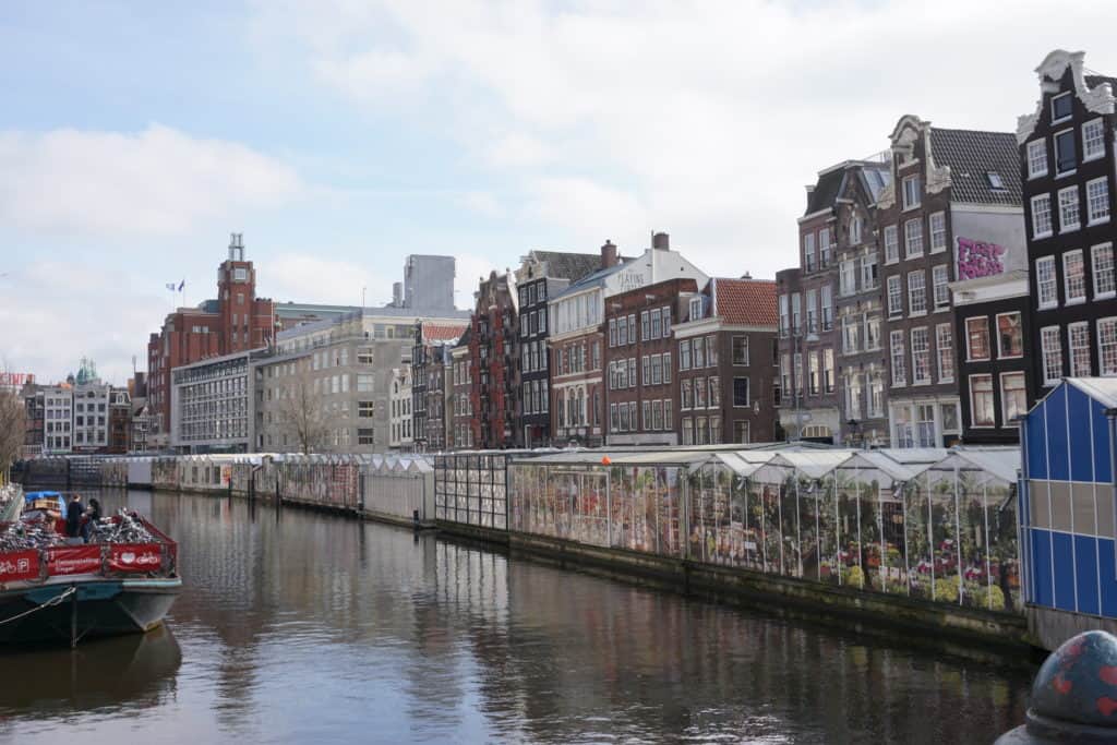 Row of backs of flower shops along the canal in Amsterdam 