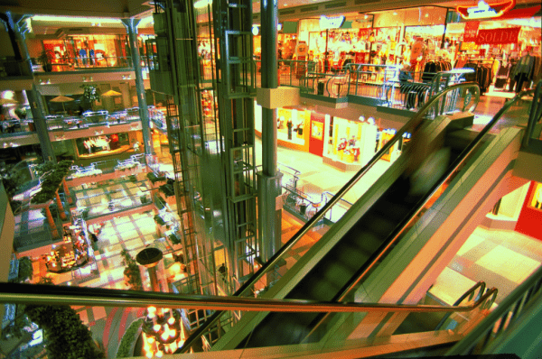 Escalator and shops in Place Montreal Trust in Montreal's Underground City.