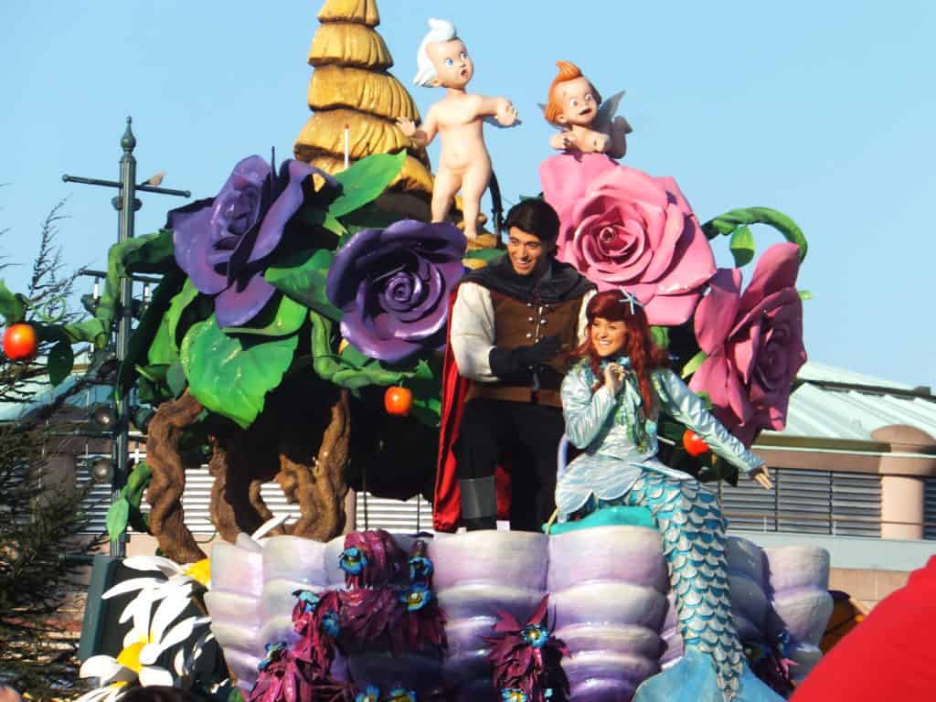 Prince Eric and Ariel from The Little Mermaid on parade float at Disneyland Paris.
