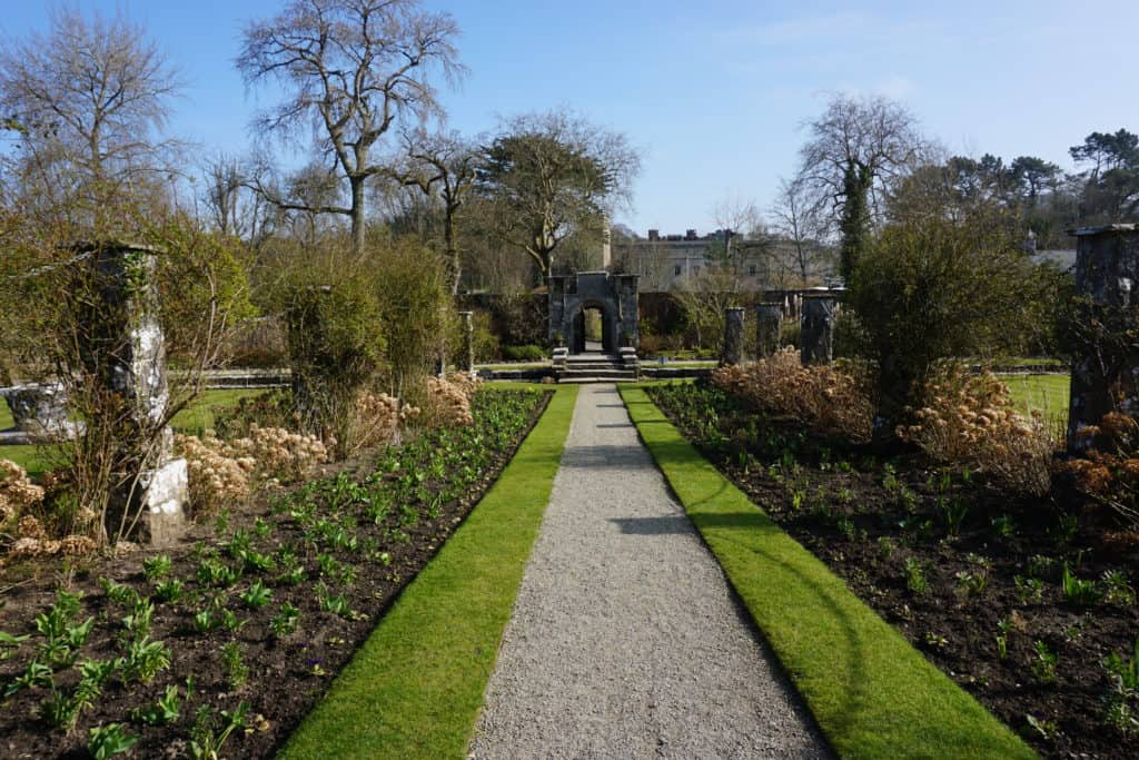 Path through gardens in early spring at Dromoland Castle.