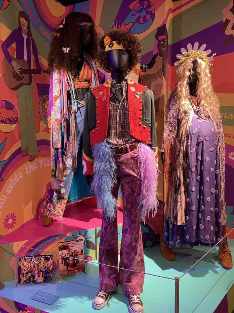 Museum of Broadway display of colourful costumes from the Hair musical.