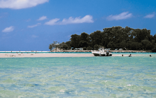 Boat in water on Noosa River Beach on the Sunshine Coast, Queensland, Australia.