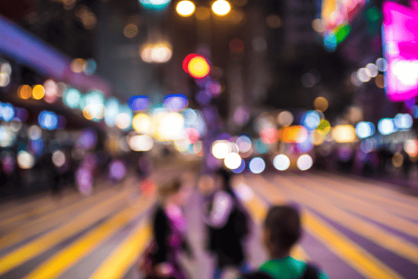 neon lights on street in hong kong at night