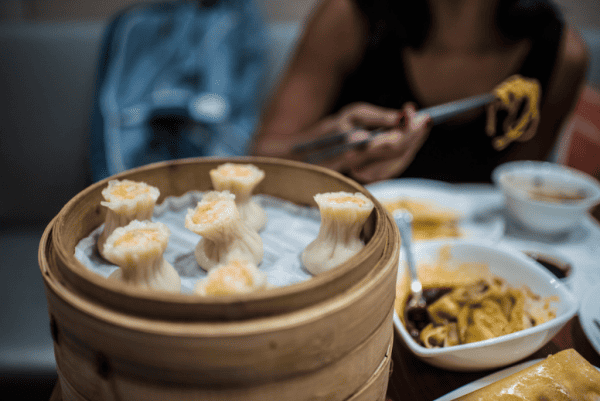 Table with dishes of food in Hong Kong.