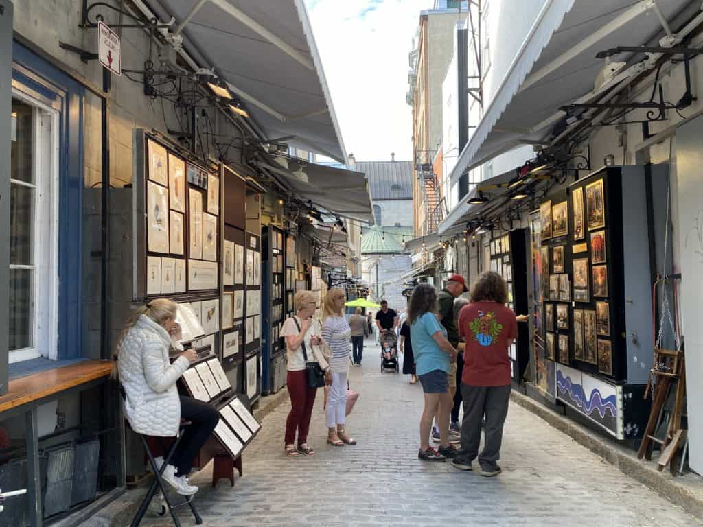 Artwork for sale in Rue du Tresor alley in Quebec City.