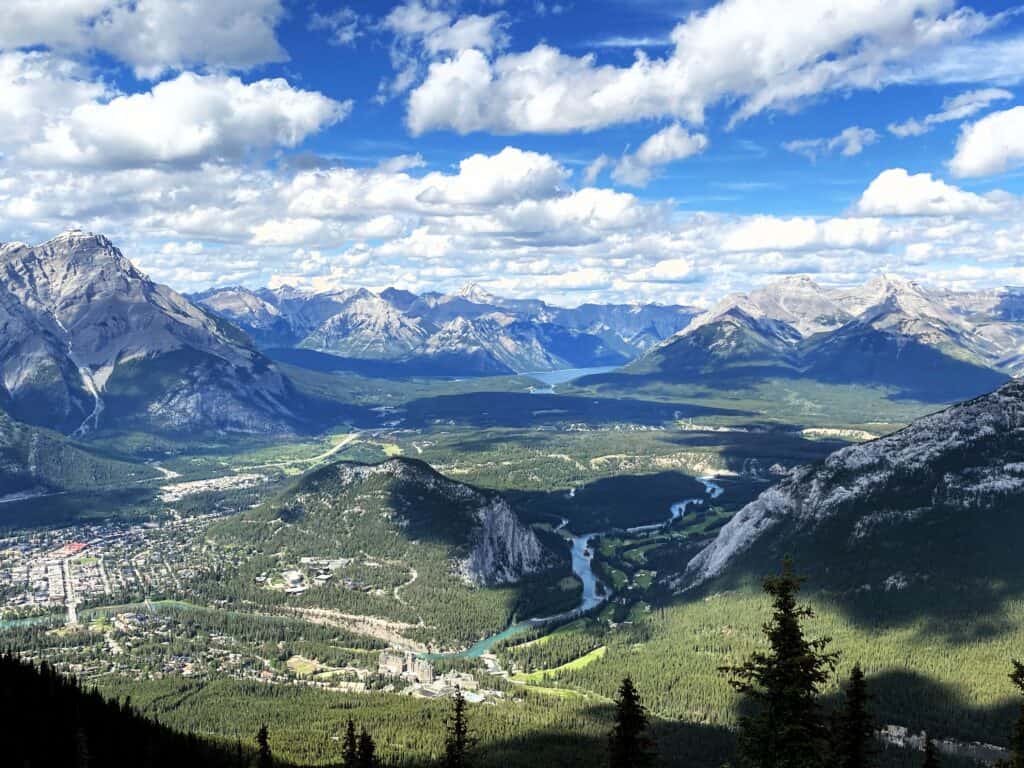 View of town of Banff, Bow river and mountains from the top of Sulphur Mountain at Banff Gondola Terminal