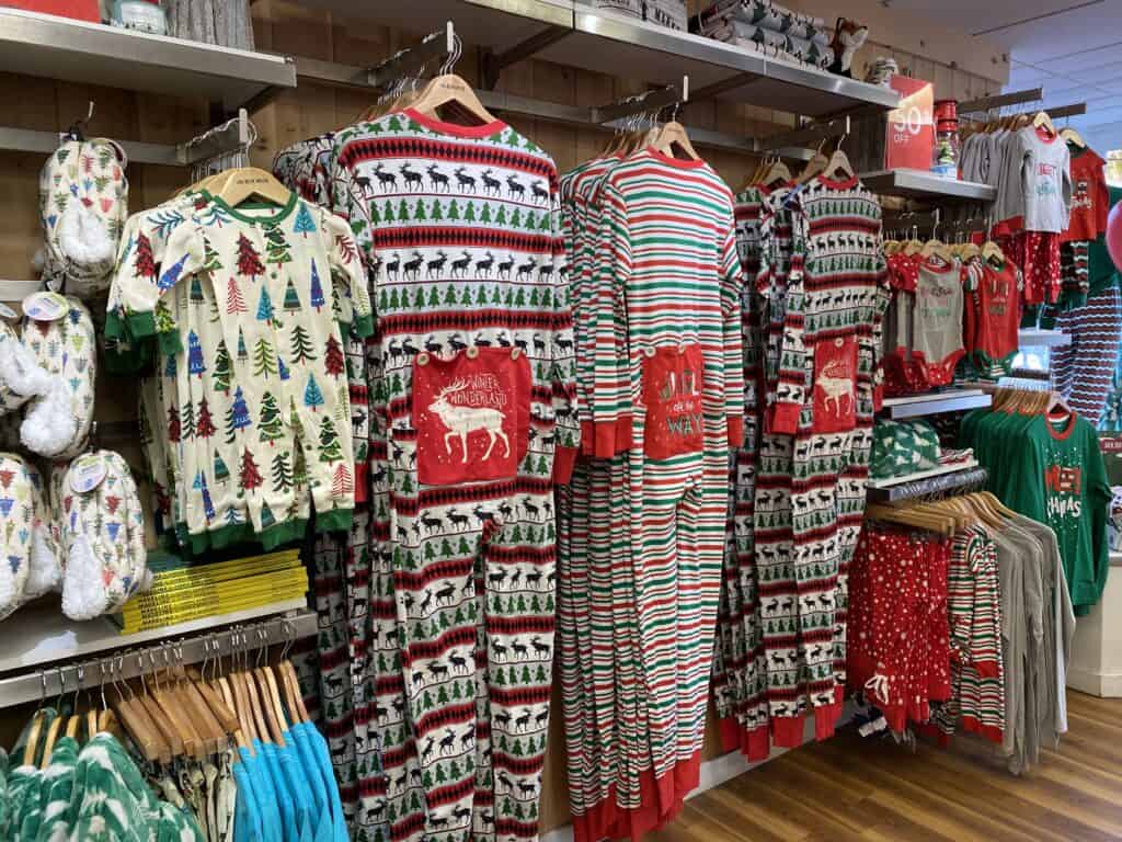 Christmas pajamas of all sizes hanging on display in the Little Blue House Hatley Boutique in Niagara-on-the-Lake.