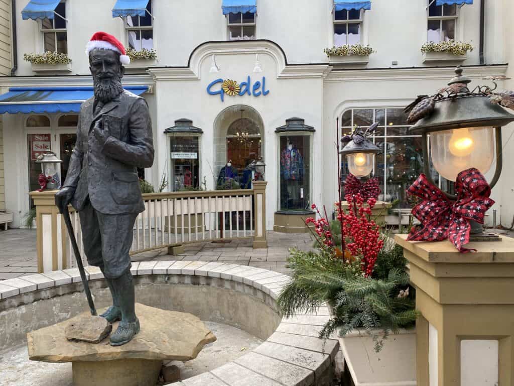 George Bernard Shaw statue wearing Santa hat.