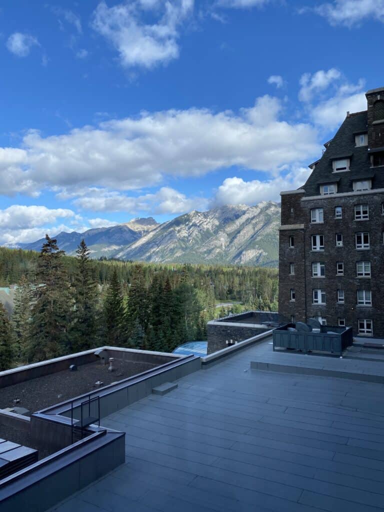 View from a room at the Fairmont Banff Springs - blue skies and mountains.