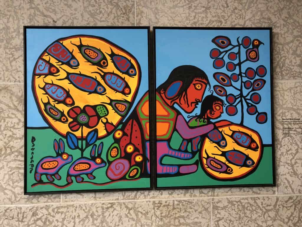 Brightly coloured painting by Norval Morrisseau.