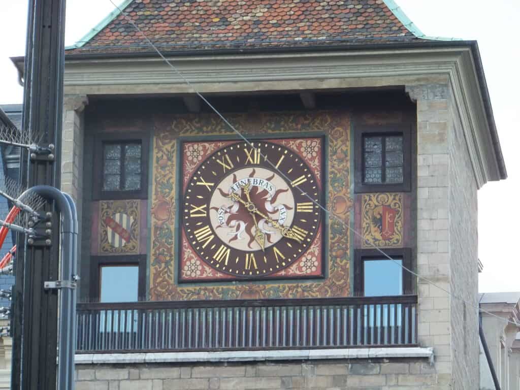 Close up of the clock face on Tour de L’Île in Geneva.