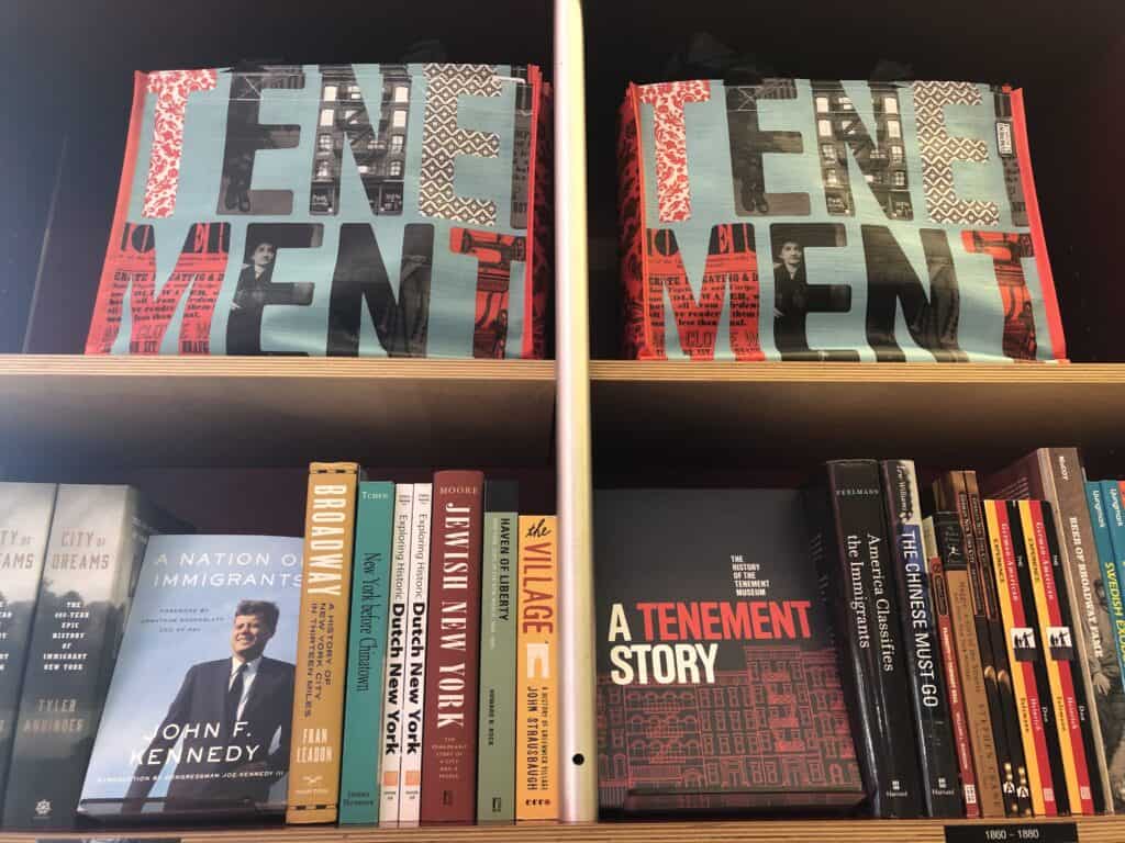 Selection of books on shelves at the Tenement Museum Gift Shop in New York City.
