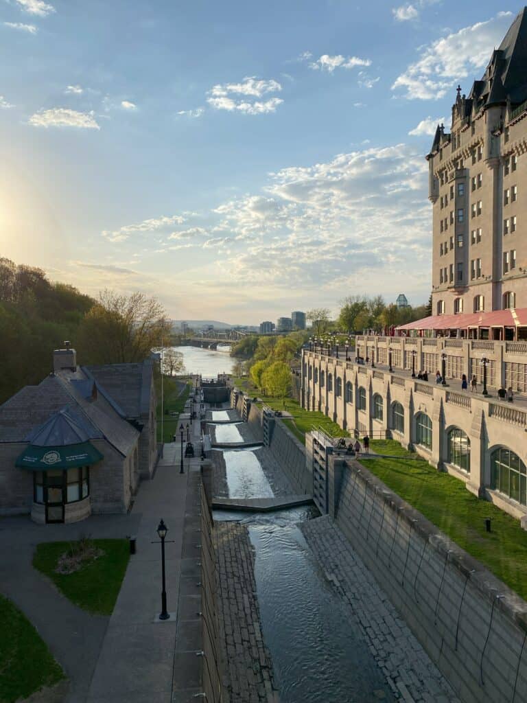Rideau Canal and Chateau Laurier as sun is setting in Ottawa.