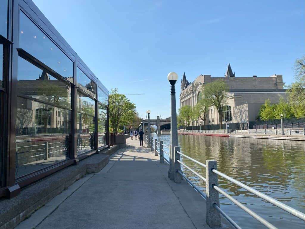 Walking along the Rideau Canal Promenade in Ottawa near Parliament Hill.