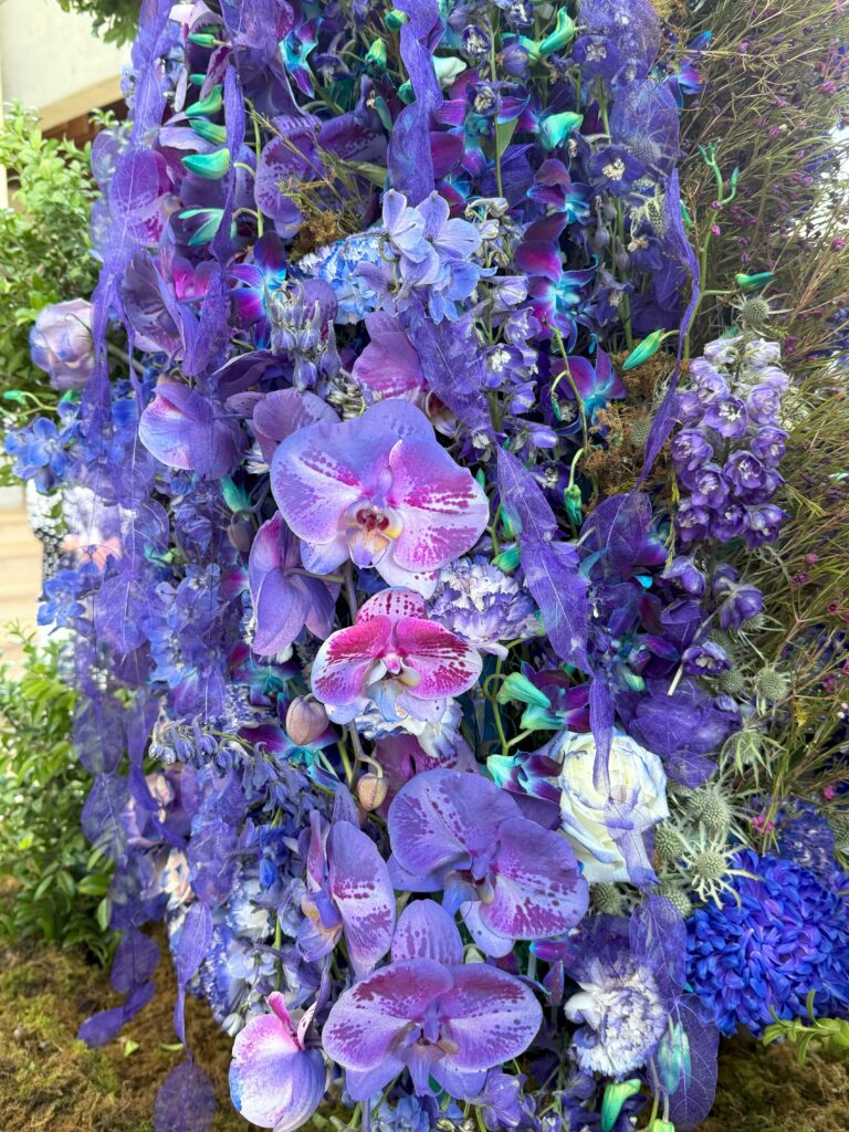 purple flowers comprising a gown at Fleurs de Villes: Downton Abbey at the Royal Botanical Gardens.