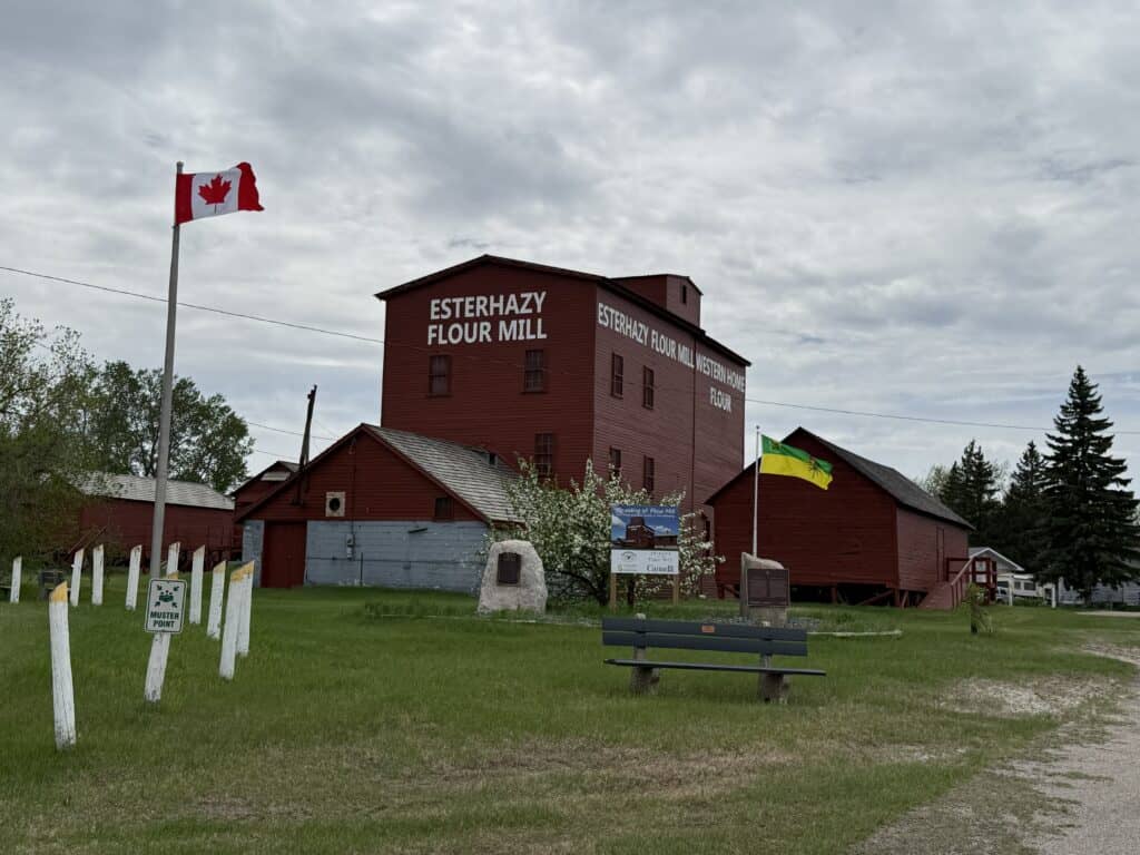 Esterhazy Flour Mill and flag of Canada.