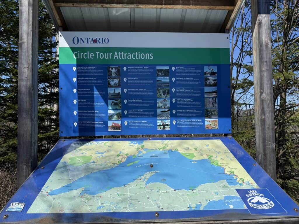 Ontario tourism board with map and list of attractions on the Lake Superior Circle Tour route.