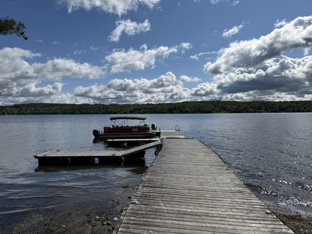 boat at end of dock at manoir hovey